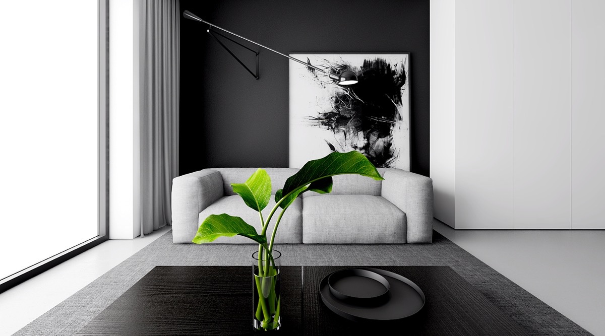 dramatic-monochrome-lounge-palm-leaves-in-a-vase-large-black-and-white-abstract-wooden-coffee-table-indoor-plants-simple-white-couch-abstract-wall-art-wall-lamo-large-window